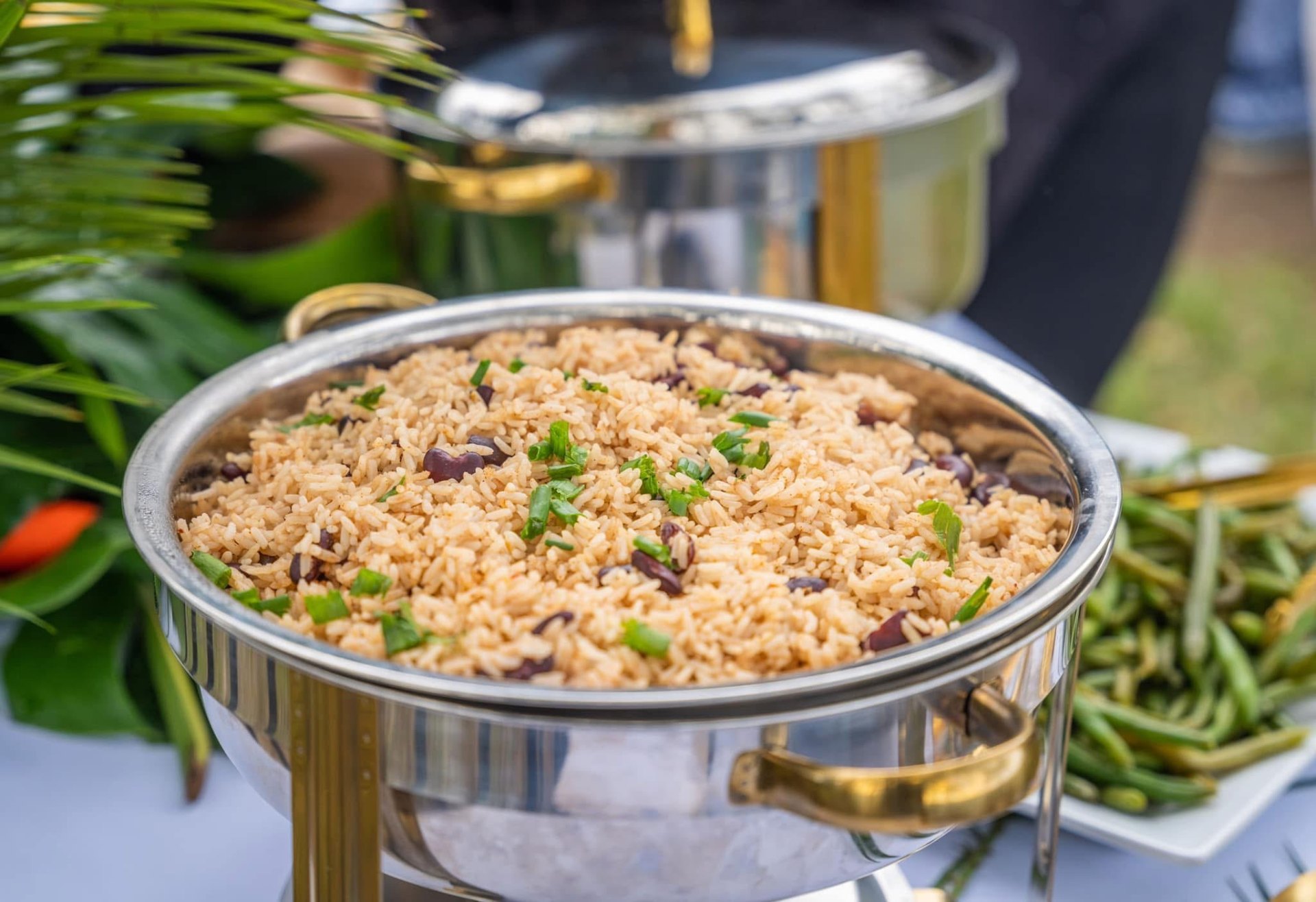Caribbean-style rice and peas in a chafing dish with green beans