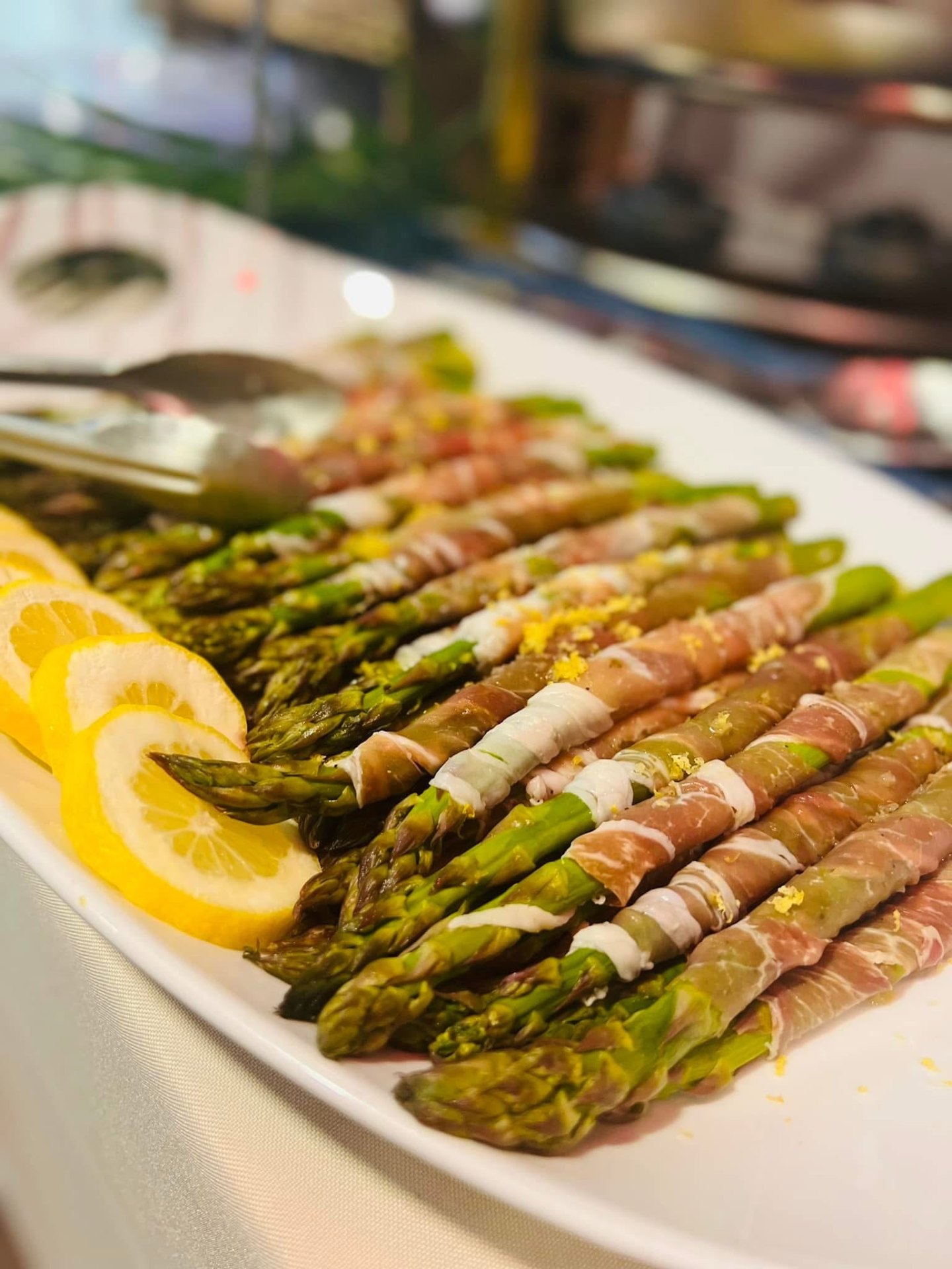 Roasted asparagus spears plated for service
